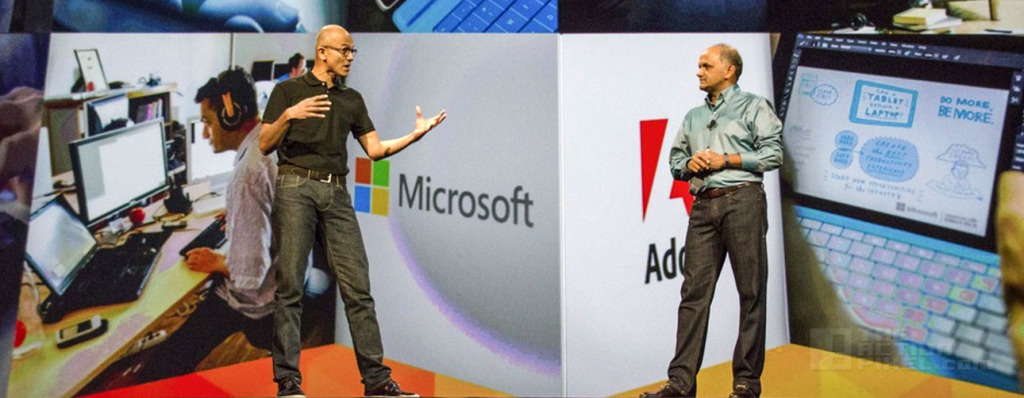 Microsoft CEO Satya Nadella and Adobe president and CEO Shantanu Narayen during the keynote presentation at Adobe's Max conference in Los Angeles, Oct. 6, 2014.